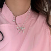 Womens Pearl And Silver Bow Pendant Necklace