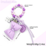 SILICONE BEAD BRACELET KEYCHAIN WITH HEART BOW_CUAB00445