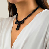 IMITATION PEARL BEADED NECKLACE WITH PEARL BOW_CWAJE1163