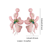 FASHIONABLE HANDMADE FLOWER RICE BEAD EARRINGS_CWAJE1657