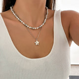 BEADED NECKLACE WITH STAR SHAPED PENDANT TASSELS_CWAJE1158