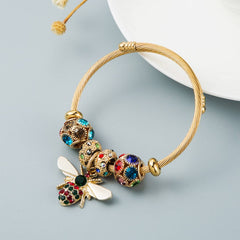 GOLD BEE CHARM BRACELET WITH SPARKLE BEADS_CWMM8475