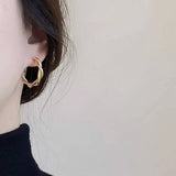 SIMPLE GEOMETRIC LARGE CIRCLE SPIRAL EARRINGS_CWAJE3137