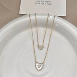 DOUBLE LAYER LOVE SHELL NECKLACE_CWAJE1258