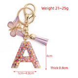 PINK SNOWFLAKE LETTER BUTTERFLY KEYCHAIN_CWMM6865