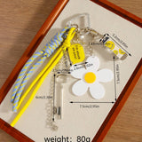 MINI SKATEBOARD KEYCHAIN WITH DAISY LETTER CHARM_CWMM7551