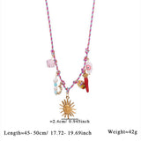 FABRIC SUN MOON NECKLACE WITH PINK CRYSTAL CHARM_CWMM7539