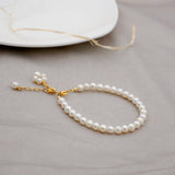 GOLD SIMPLE PEARL BRACELET_CWAJE1685