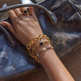 THICK RIBBED CROSS CHAIN BRACELET 18K GOLD STEEL_CWAJE4809