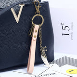 RESIN WOLF TOOTH VINTAGE COWHIDE KEYCHAIN_CWMM5028