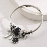SILVER STEEL BRACELET WITH BOW FLOWER CHARMS_CWMM8613