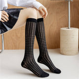 HOLLOW JACQUARD MIDDLE CALF SOCKS_CWMS0650