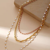 STAINLESS STEEL GOLD PLATED CLAVICLE NECKLACE_CWMM3676