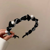 RETRO LOVE TWIST PEARL HEADBAND_CWAHA0829