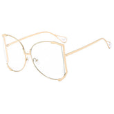 RUNWAY OVERSIZED SUNGLASSES WITH GEM ARMS_CWASG1181