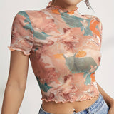 FLORAL PRINT MESH TOP WITH RUFFLE DETAILING_CWTBLS1510