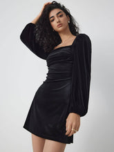 Velvet Dress With A Square Neck And Long Sleeves