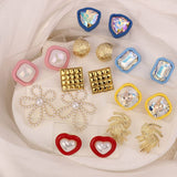 NEW SIMPLE HOLLOW FLOWER ENAMEL EARRINGS_CWAJE3991