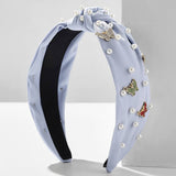 SOLID COLOR BUTTERFLY PEARL WIDE BRIM HEADBAND_CWAHA2605