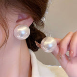 FAUX PEARL DESIGN STUD EARRINGS_CWAJE0449
