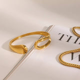 MINIMALIST IRREGULAR OPEN CUFF IN 18K GOLD STEEL_CWAJE4863