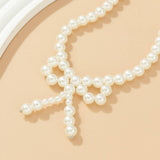 IMITATION PEARL BEADED NECKLACE WITH PEARL BOW_CWAJE1163