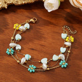 CRYSTAL PETALS 18K GOLD PLATED BRACELET_CWMM3728