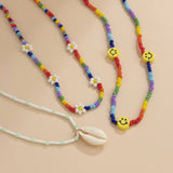 SHELL SMILEY DAISY BRAIDED NECKLACE_CWAJE1500