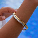 GOLD SILVER WAVE BANGLE IN 18K STAINLESS STEEL_CWAJE4782