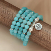 108 LOTUS PENDANT LIGHT BLUE BEADED BRACELET_CWAJE3946
