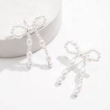 BOW FRENCH TASSEL PEARL EARRINGS_CWAJE1156
