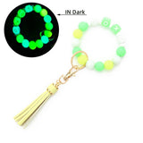 GLOW IN THE DARK WRISTBAND WITH TASSEL KEYCHAIN_CWMM6870