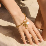 FISHBONE SHELL CHARM BRACELET 18K GOLD STEEL_CWAJE4752