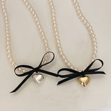 BOWKNOT DOUBLE PEARL HEART PENDANT NECKLACE_CWAJE3080