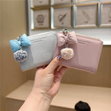 Textured Bow Pendant Bifold Wallet_Cwab06235