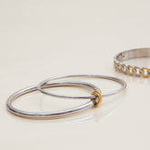 CLASSIC TWO TONE DOUBLE RING BANGLE 18K GOLD_CWAJE4823