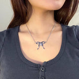 DOUBLE SIDED OIL DRIP STAR BOW EARRINGS_CWAJE5042