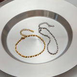 18K GOLD OVAL BEAD BRACELET TITANIUM STEEL LUXE_CWAJE4719