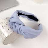 SOLID COLOR TEXTURED FABRIC CROSS HEADBAND_CWAHA2084