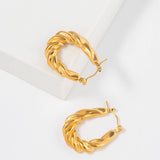 GOLD STAINLESS STEEL TWISTED U SHAPED EARRINGS_CWMM3652