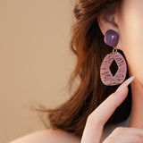 IRREGULAR GEOMETRIC TEMPERAMENT EARRINGS_CWAJE2336