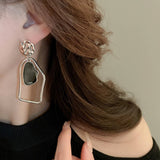 FOLDED GEOMETRIC ASYMMETRIC EARRINGS_CWAJE2067