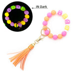GLOW IN THE DARK WRISTBAND WITH TASSEL KEYCHAIN_CWMM6870
