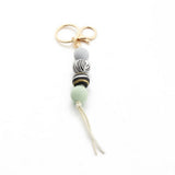 LEOPARD WOOD BEAD KEYCHAIN WITH MINI TASSEL_CWMM7022