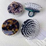 SIMPLE AND PORTABLE MASSAGE COMB_CWMM1083