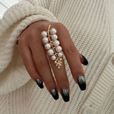 IRREGULAR HOLLOW WINDING IMITATION PEARL RING_CWMM3234