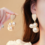 OIL DROP HEART PEARL VINTAGE TASSEL EARRINGS_CWAJE2341