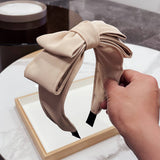 BLACK HIGH TOP BOW WIDE BRIM HEADBAND_CWAHA2562