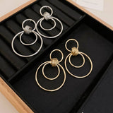 MINIMALIST GLOSSY CIRCULAR COMMUTING EARRINGS_CWAJE2049