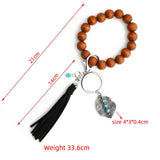 BOHO TASSEL KEYCHAIN WITH LEAF CHARM AND WOOD BEADS_CWAB5087